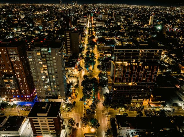 What innovative approaches can be used to improve indoor environmental quality in real estate developments?